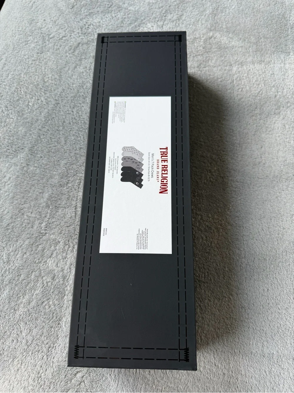 True Religion Black Gift Box with Red Logo and Silver Horseshoe Cutouts